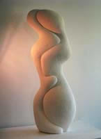 Abstract sculpture carved in limestone entitled 'lust'